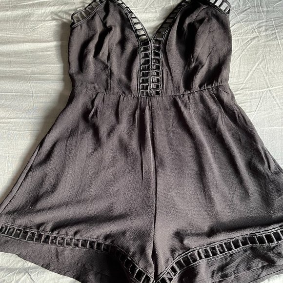 Trac Black Romper - Picture 1 of 7